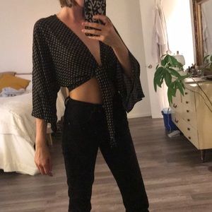 Olivacious black and ivory wrap top